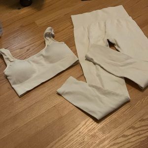 Cream colored ribbed leggings and bra set. Size medium. Brand new. Never worn.